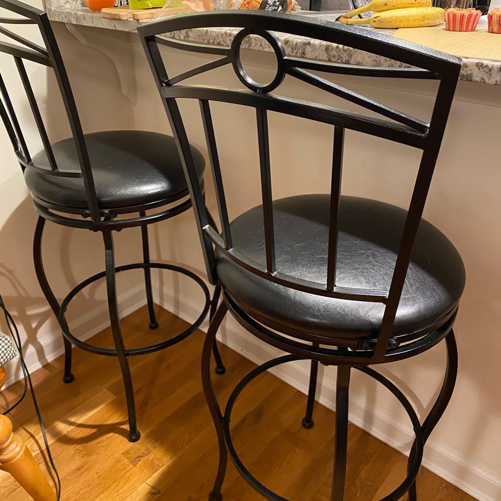 4 black bar stools with seat cushions & swivel